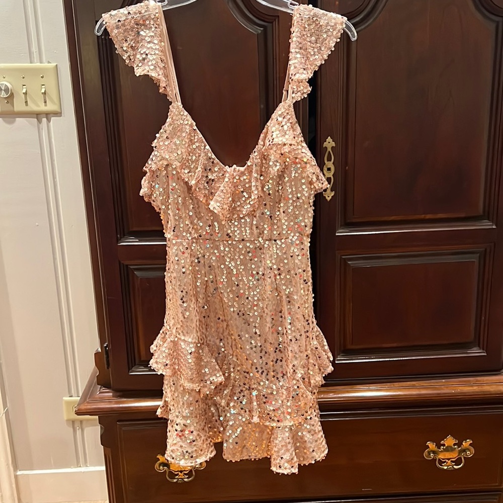 Rose Gold sequined ruffled mini dress. Size XS. Purchased from Hello Molly